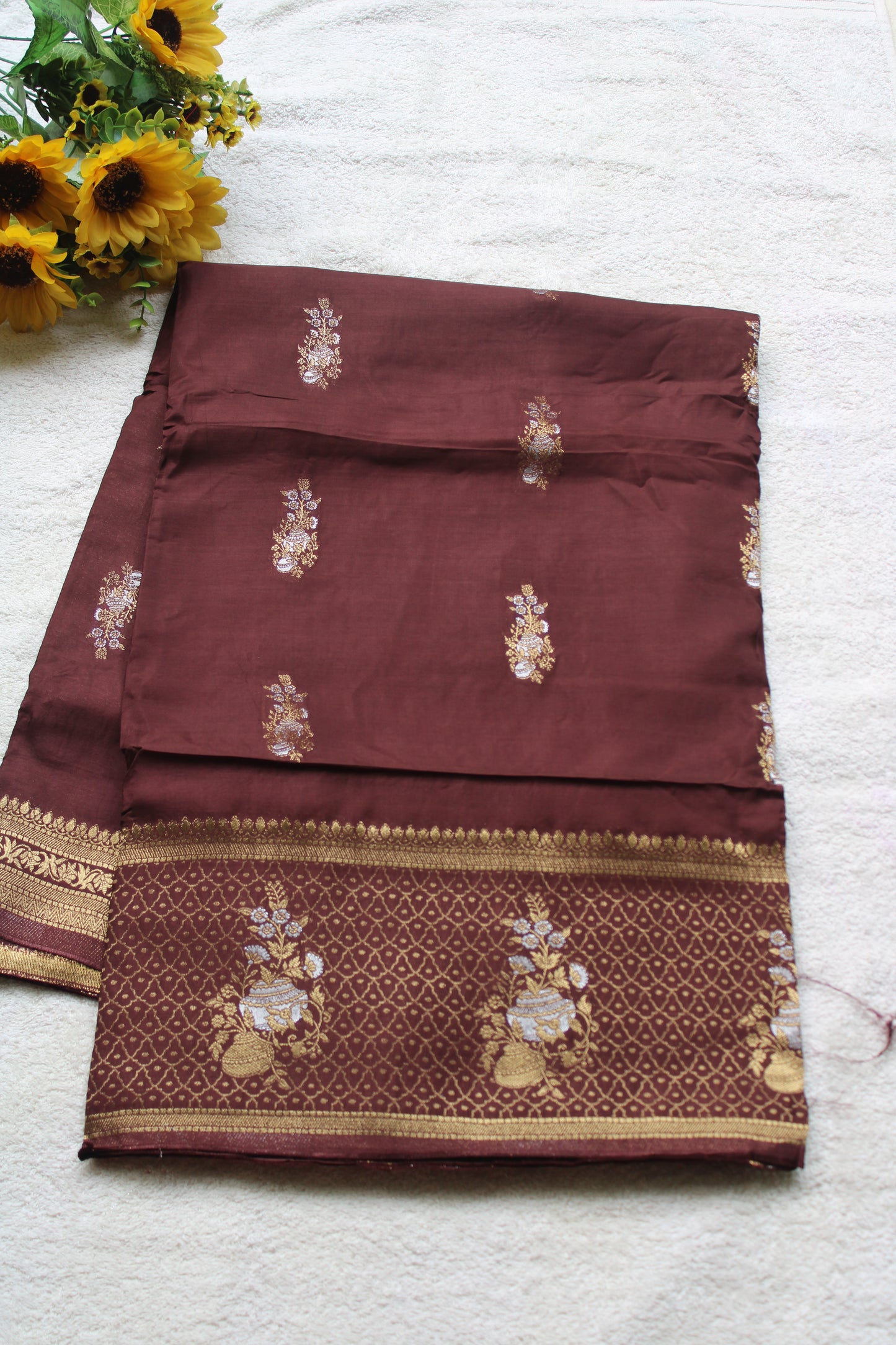 Chocolate Brown Banarasi Russian crape saree with checked and floral border