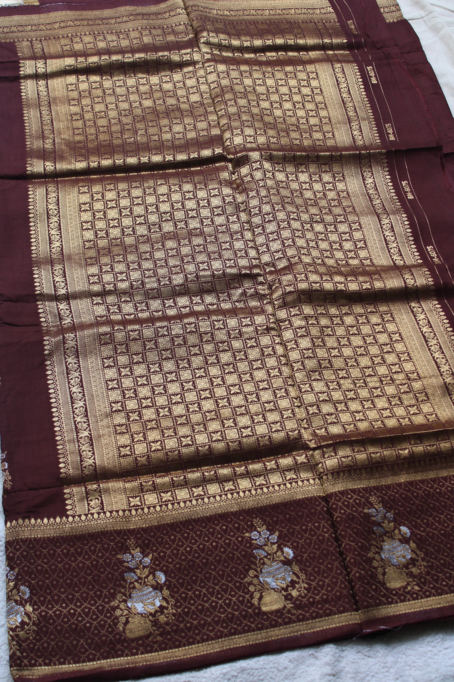 Chocolate Brown Banarasi Russian crape saree with checked and floral border