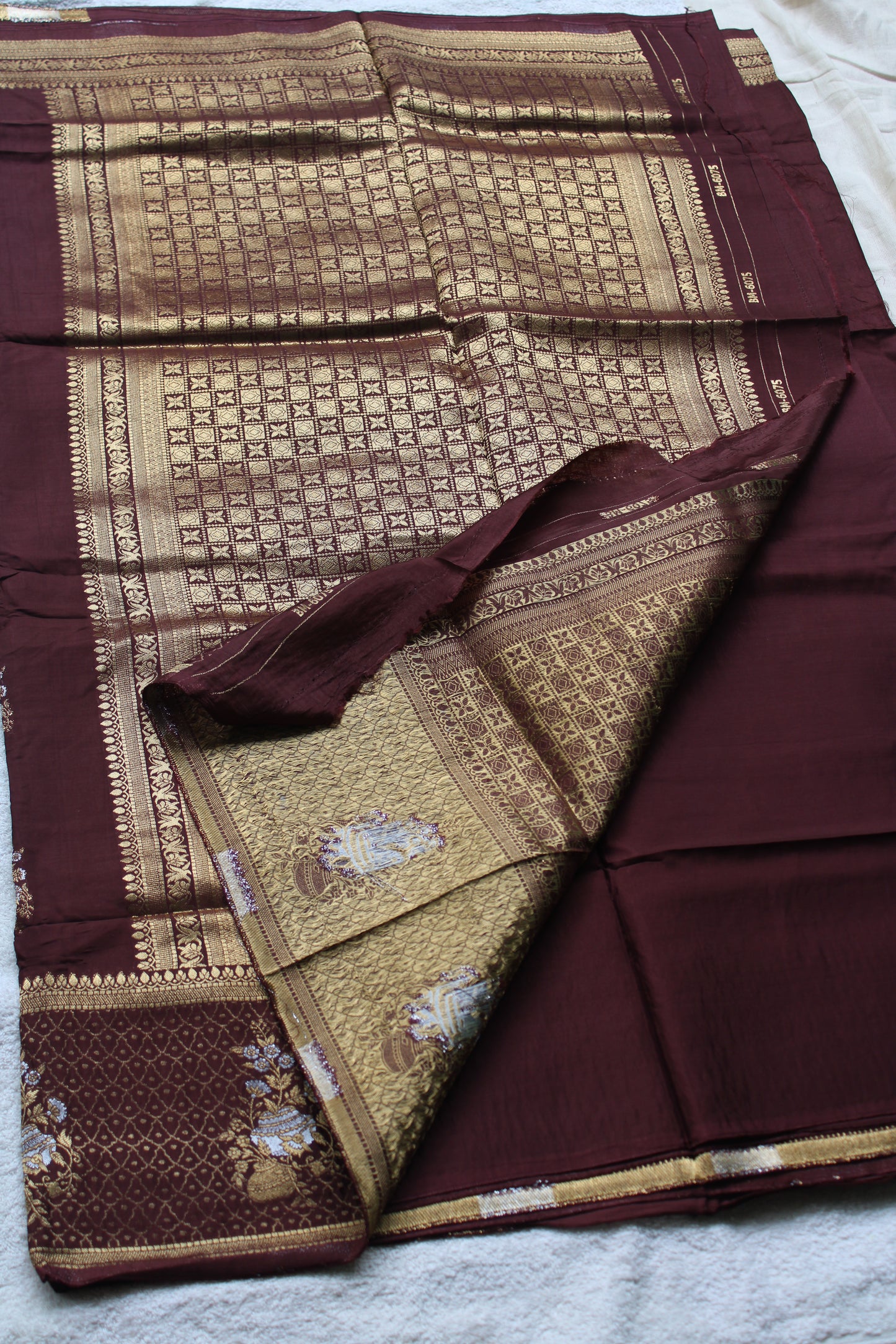 Chocolate Brown Banarasi Russian crape saree with checked and floral border