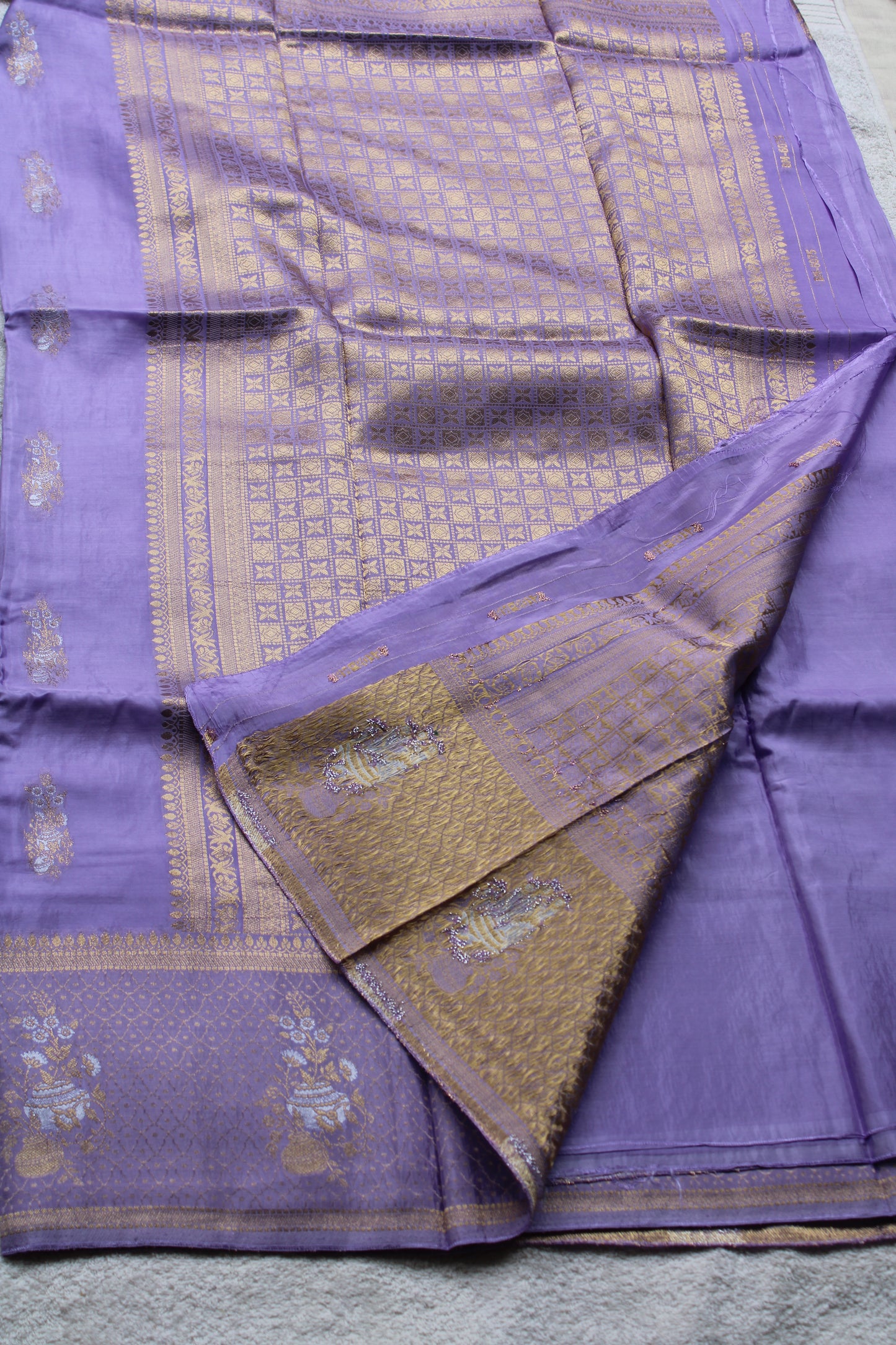 Lavender Banarasi Russian crape saree with checked and floral border