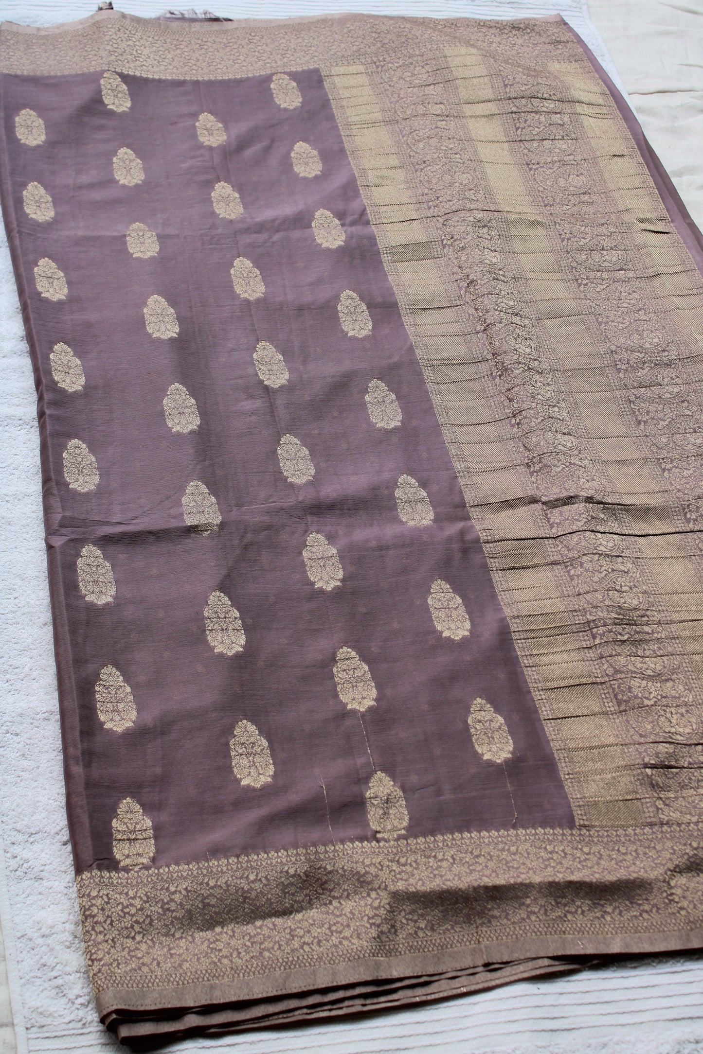 Mauve Banarasi Russian crape saree with checked and floral border