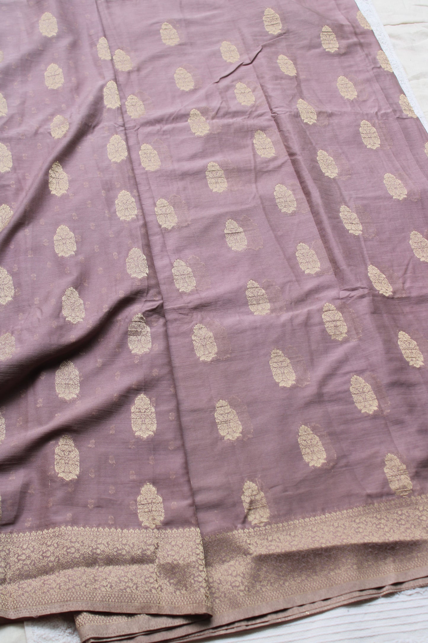 Mauve Banarasi Russian crape saree with checked and floral border