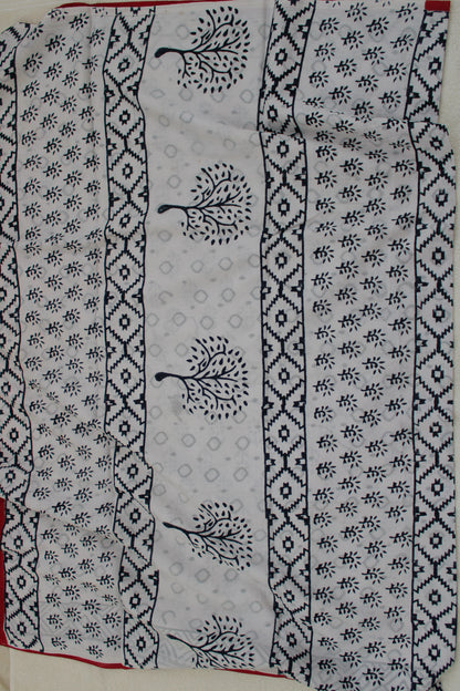 White hand block printed mul mul cotton with flower motifs