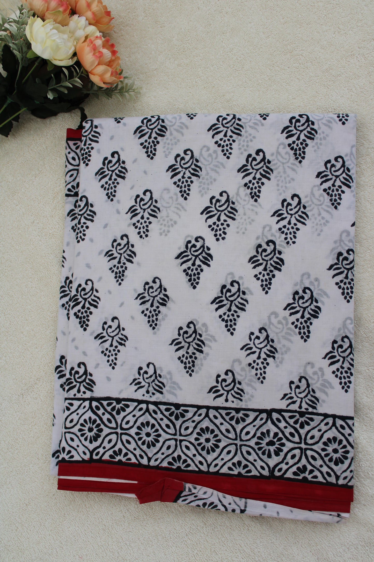 White hand block printed mul cotton saree leaf design