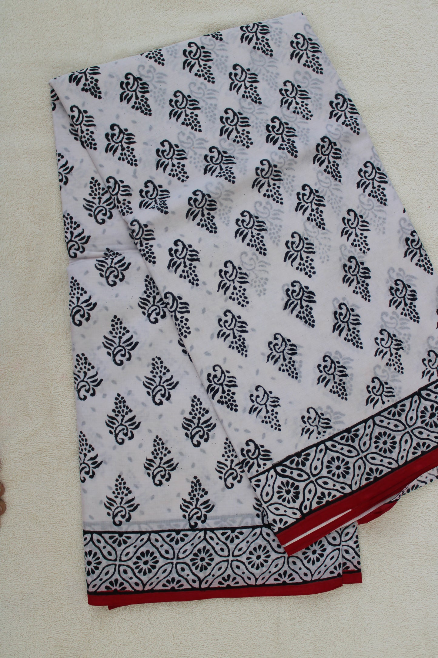White hand block printed mul cotton saree leaf design