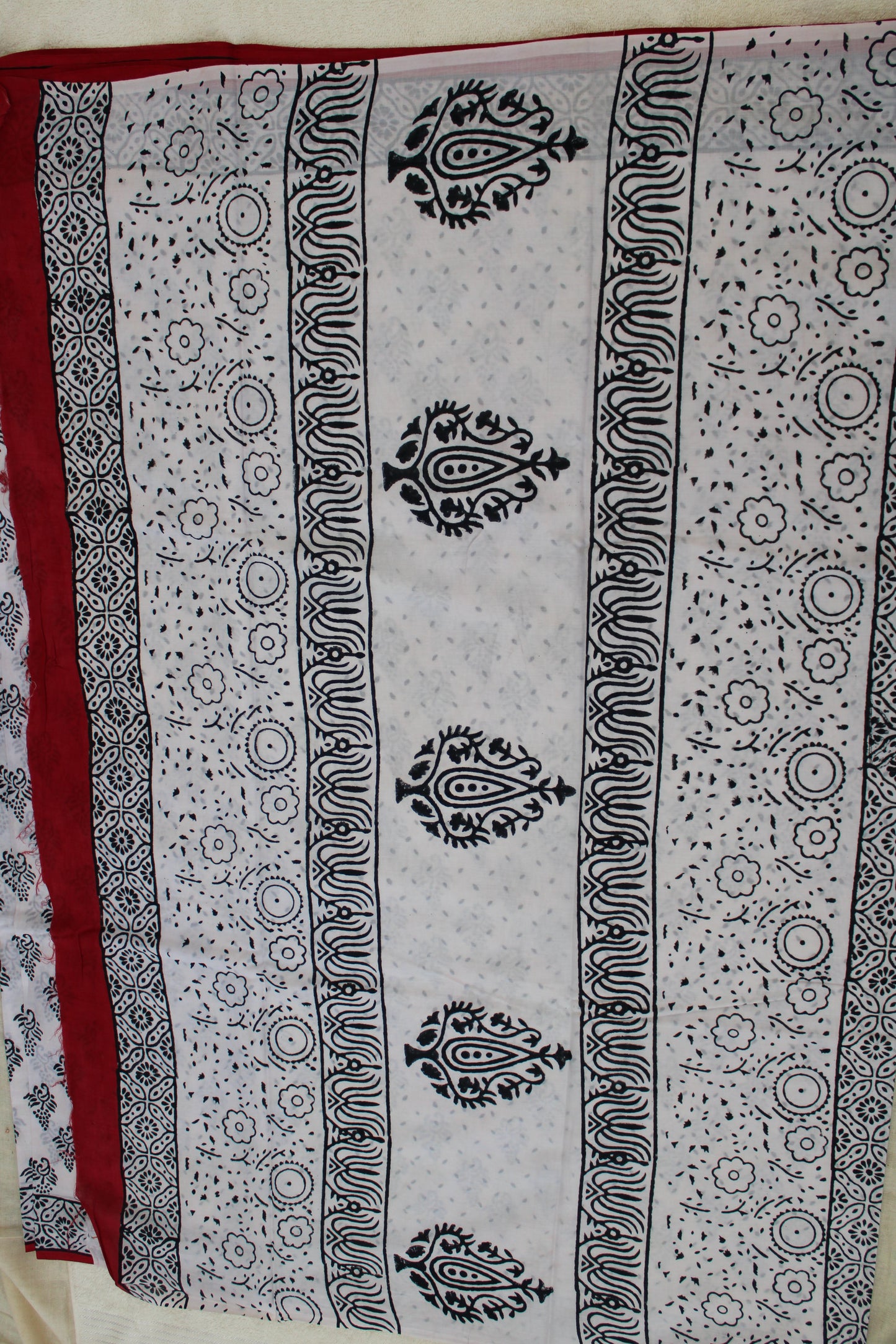 White hand block printed mul cotton saree leaf design