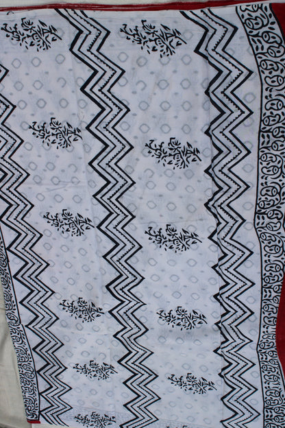 White hand block printed saree with peacock leaf design