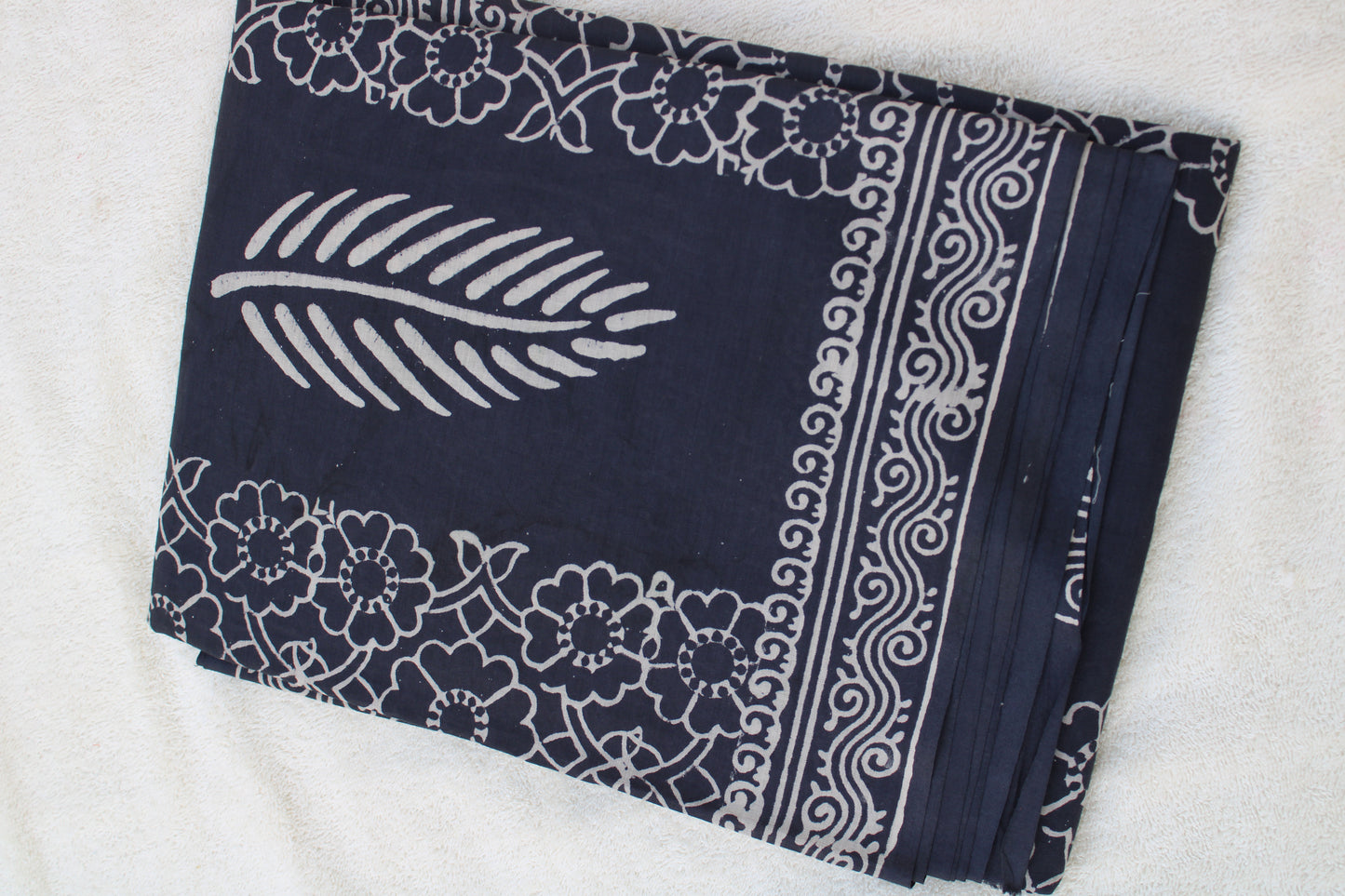 Grey with white leaf block printed mul cotton saree