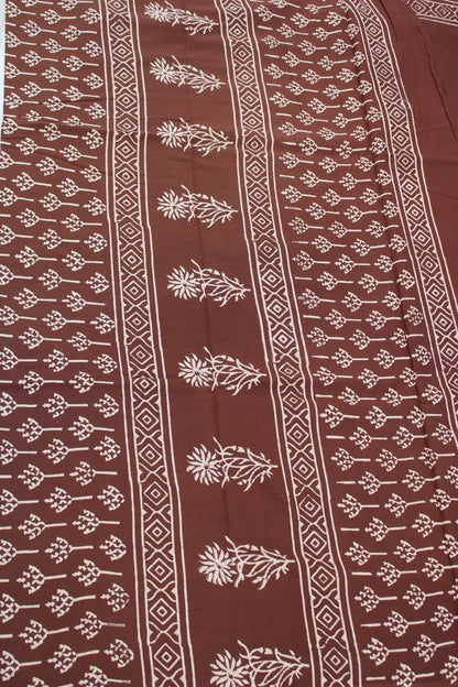 Brown with white block printed mul cotton saree