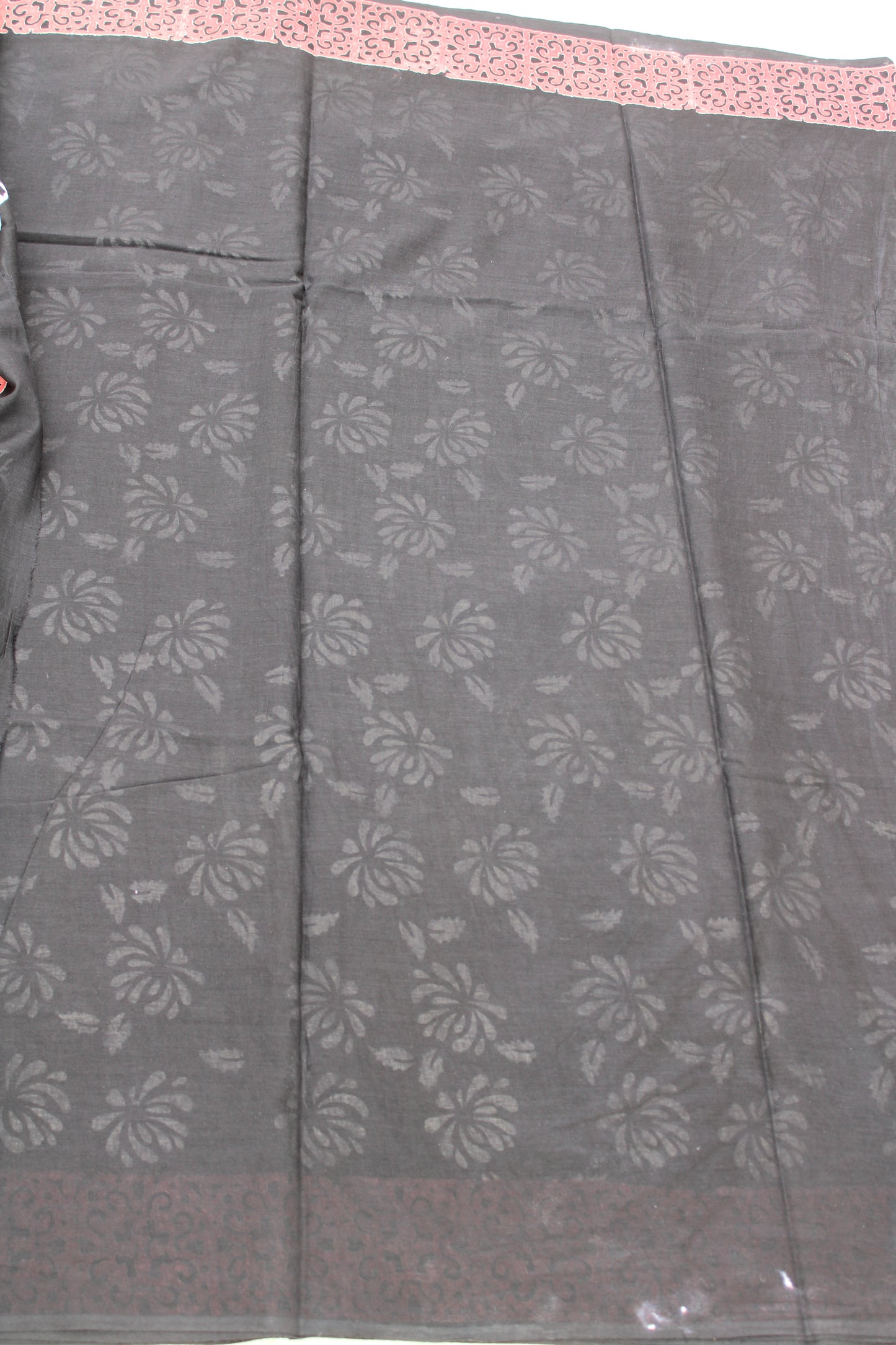 Black with white flower block printed mul cotton saree with Reb border