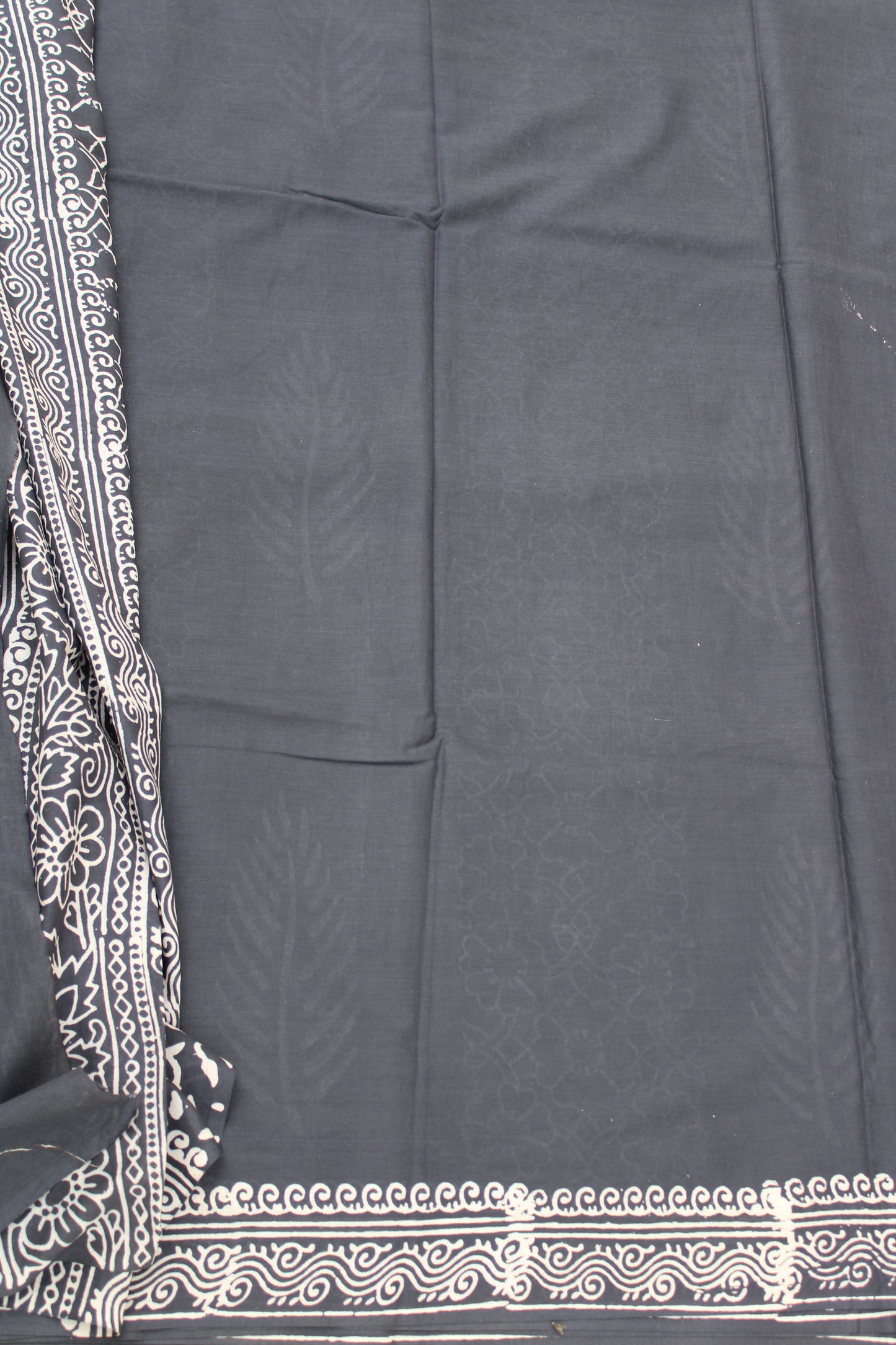 Grey with white leaf block printed mul cotton saree