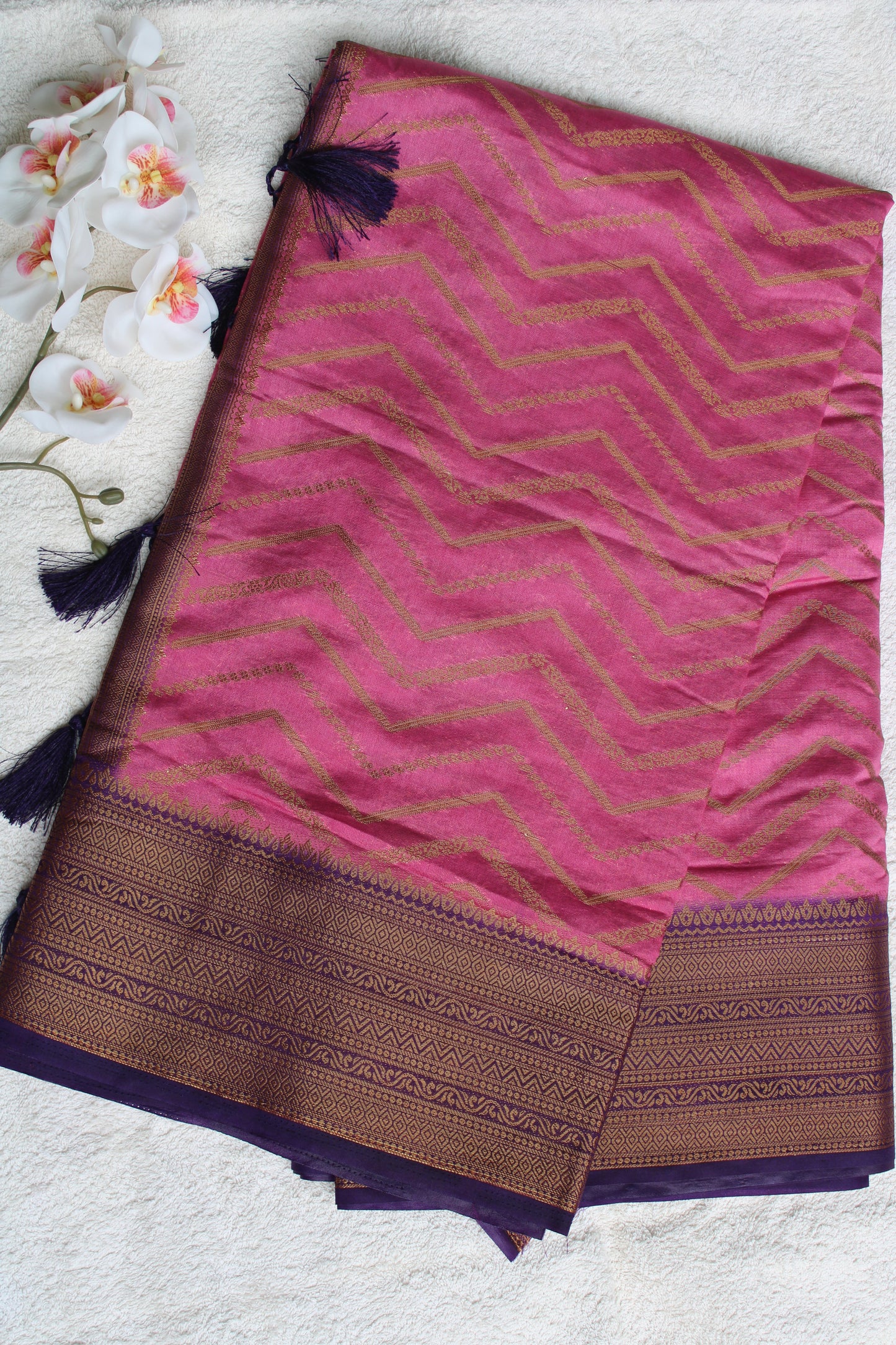 Pink Zari woven saree with contrast brocade blouse