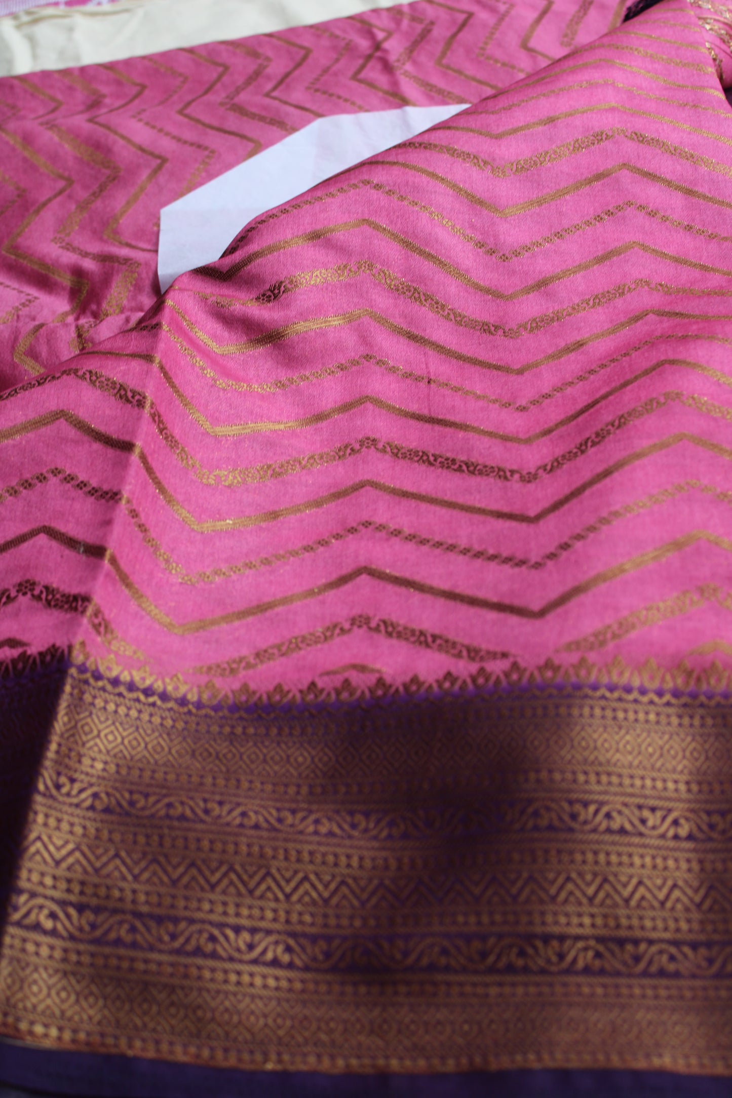 Pink Zari woven saree with contrast brocade blouse