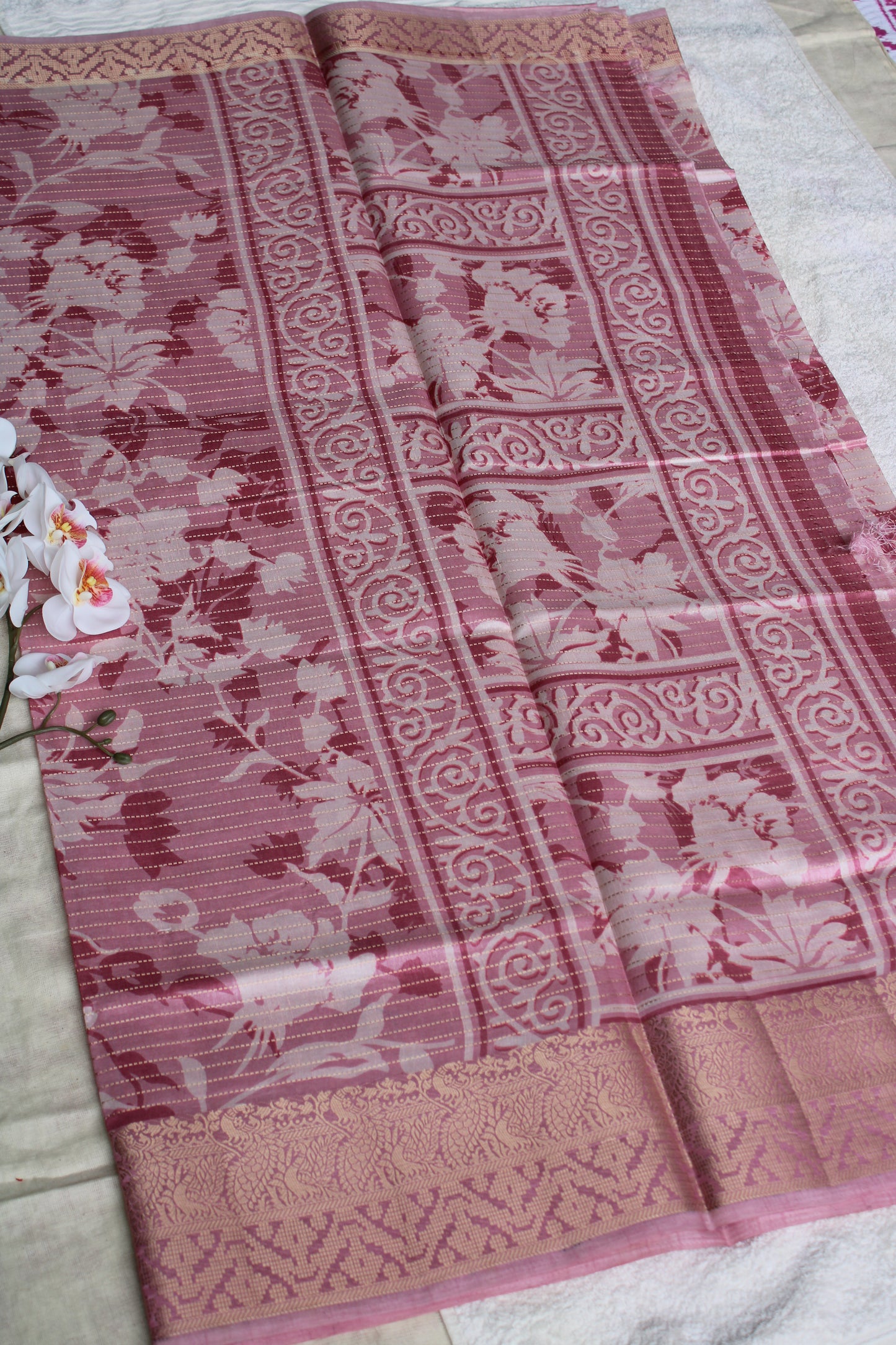 Pink tusser saree with zari horizantal lines and zare border