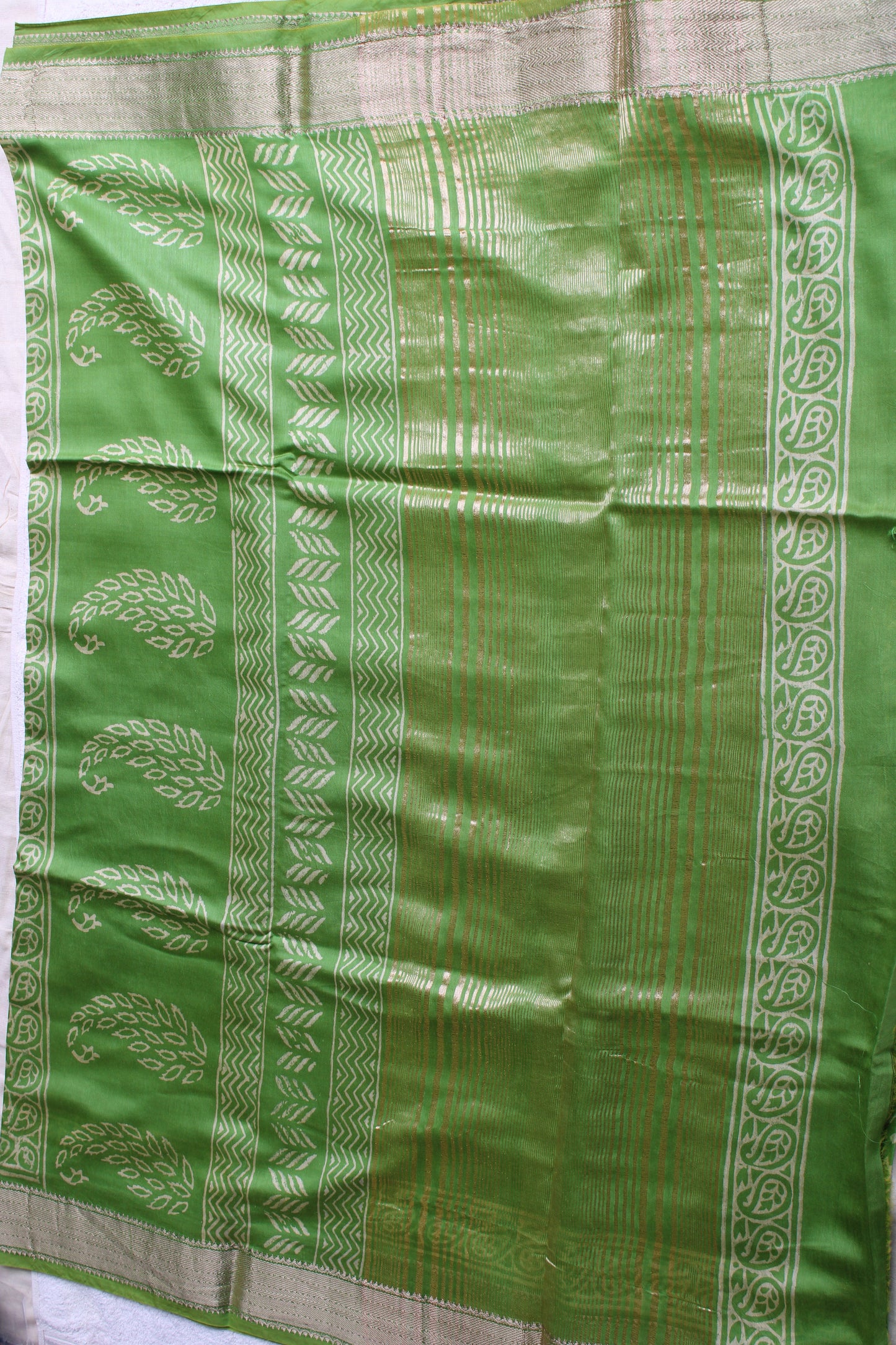 Green Maheshwari Art silk saree with block prints and zari border