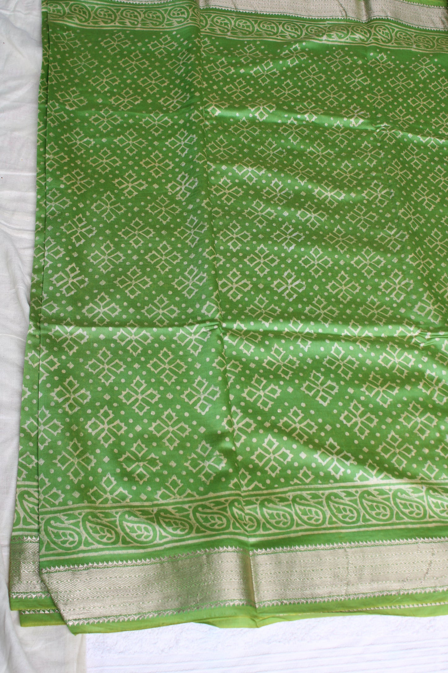 Green Maheshwari Art silk saree with block prints and zari border