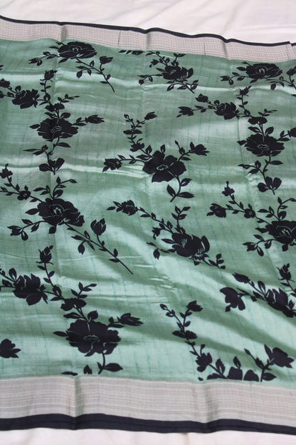 Green Tussur Crape saree with floral design