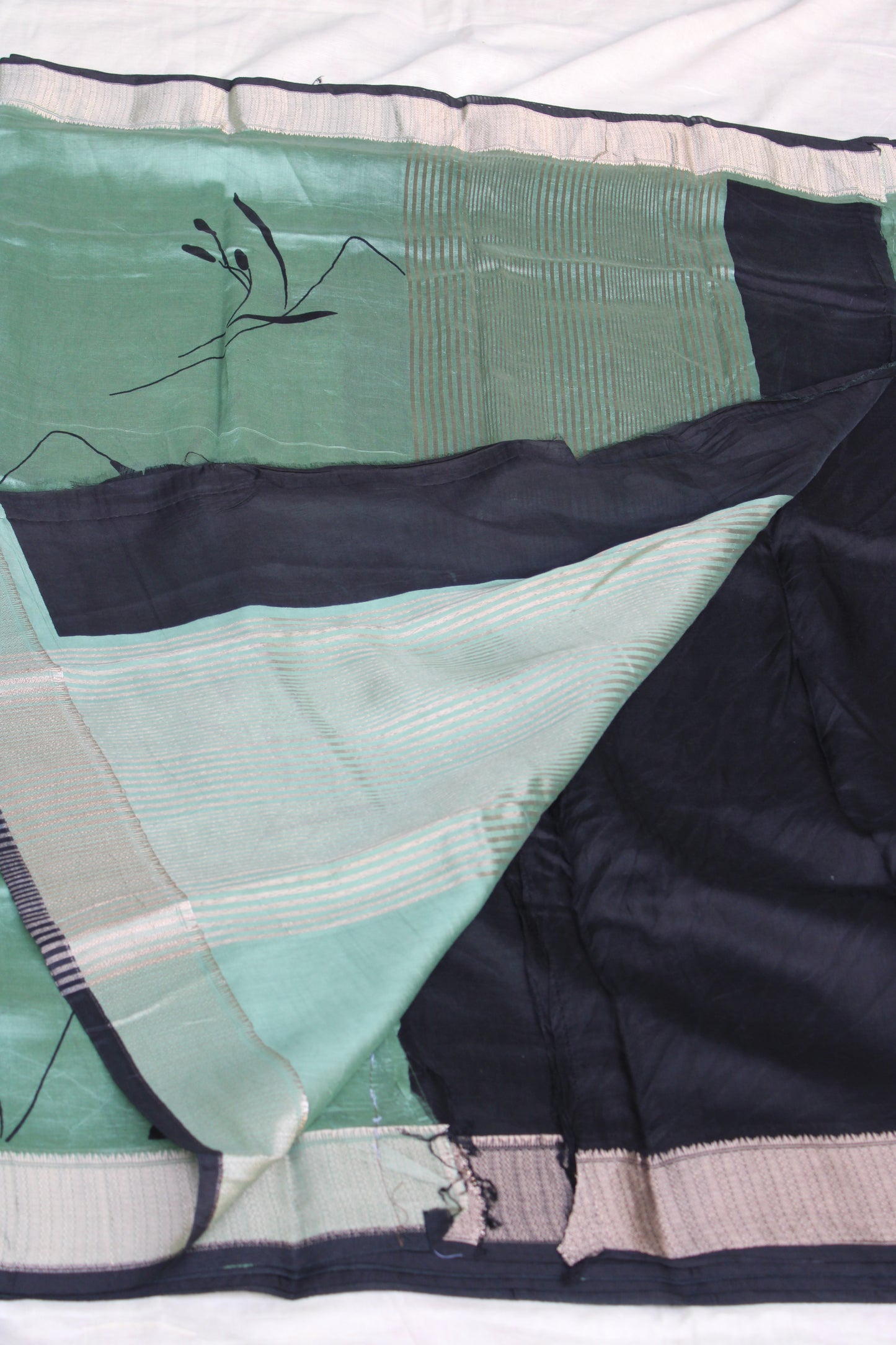 Green Tussur Crape saree with floral design