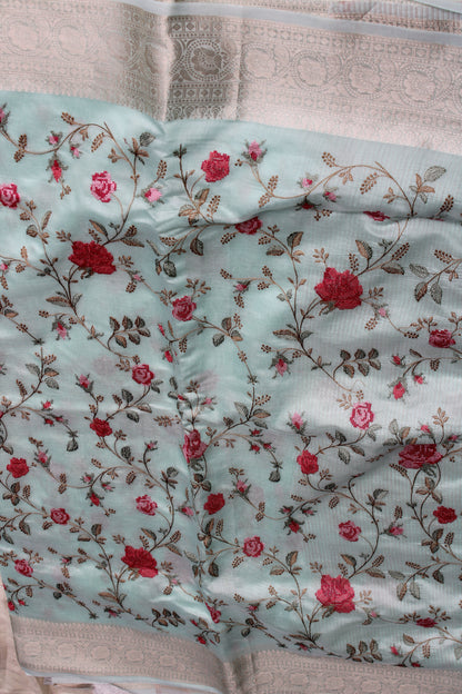 Pastel blue lenin silk saree with Banarasi parsi work and zari border