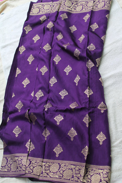 Banarasi purple saree with small trending border and new flower motifs