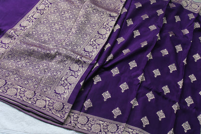 Banarasi purple saree with small trending border and new flower motifs