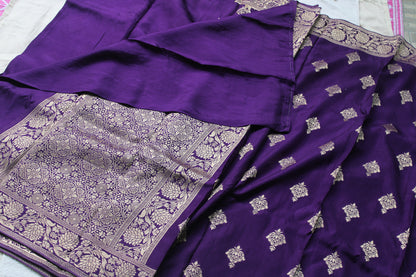 Banarasi purple saree with small trending border and new flower motifs