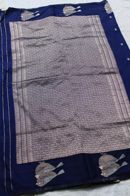 Blue Mona silk saree with figure motifs and open border