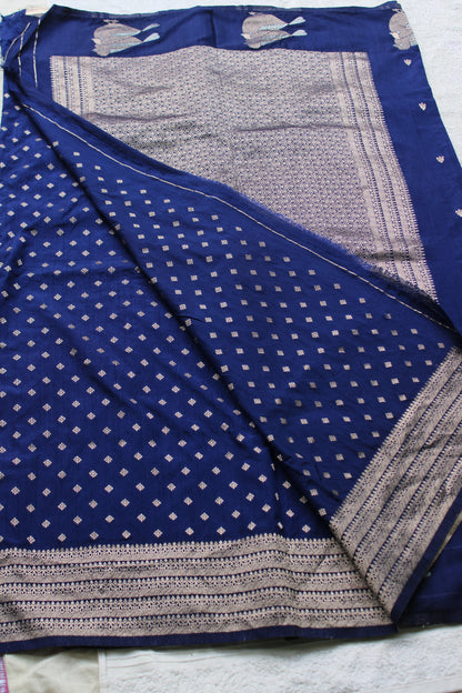 Blue Mona silk saree with figure motifs and open border