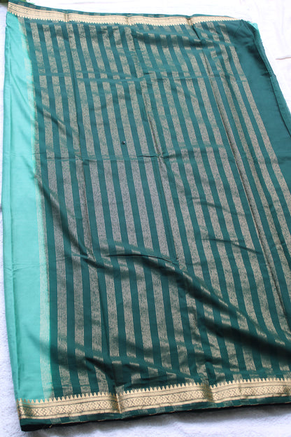 Green Premium Mysore silk saree with Small traditional border with contrast blouse