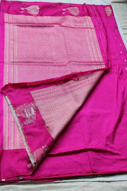 Pink Mona silk saree with figure motifs and open border