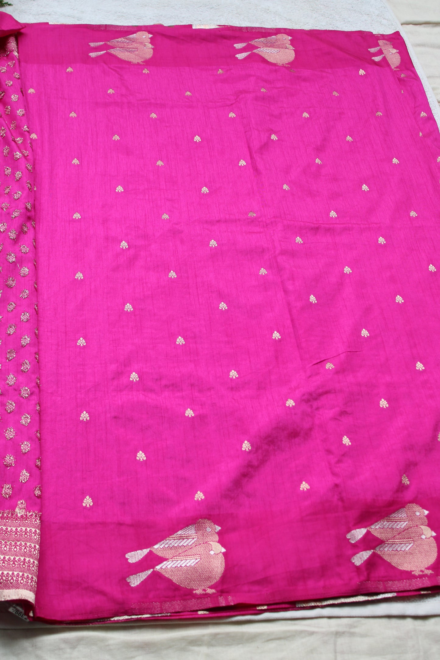 Pink Mona silk saree with figure motifs and open border