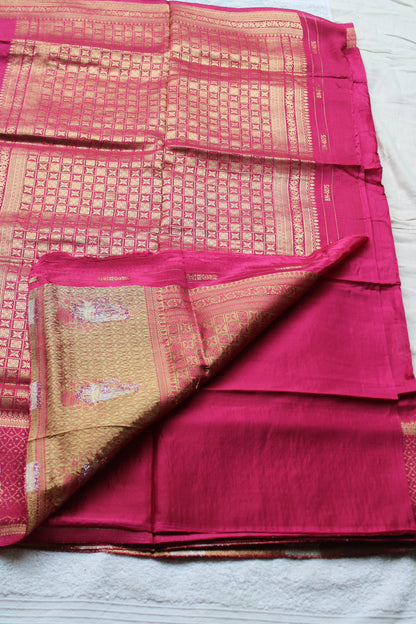 Pink Banarasi Russian crape saree with checked and floral border