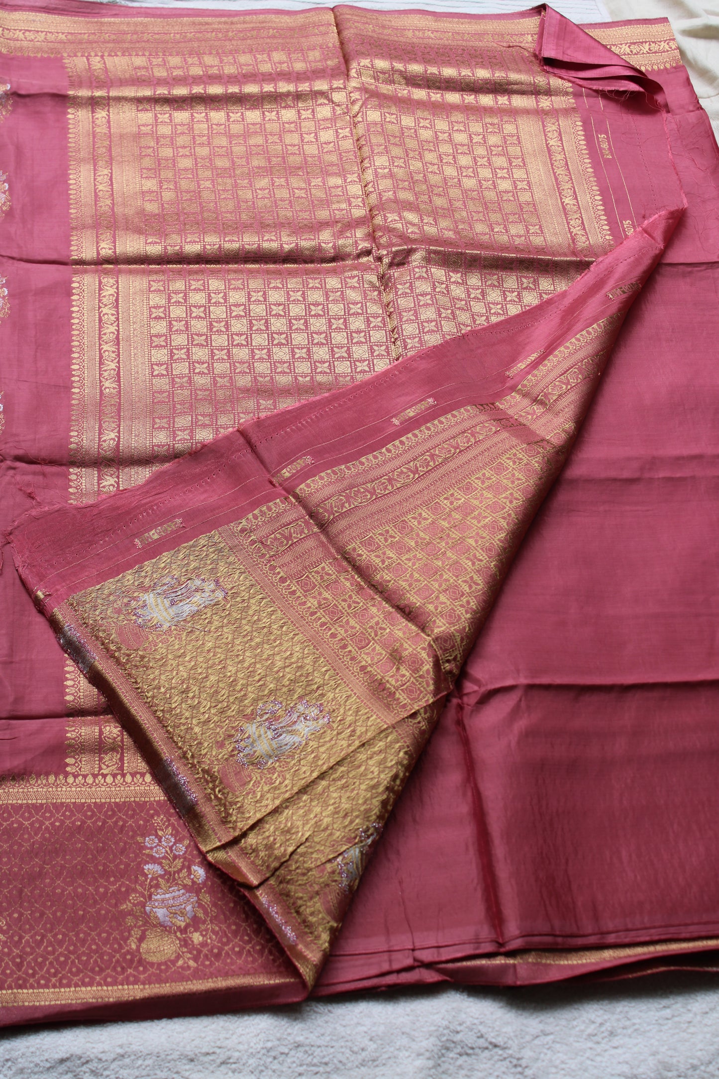 Pink Banarasi Russian crape saree with checked and floral border